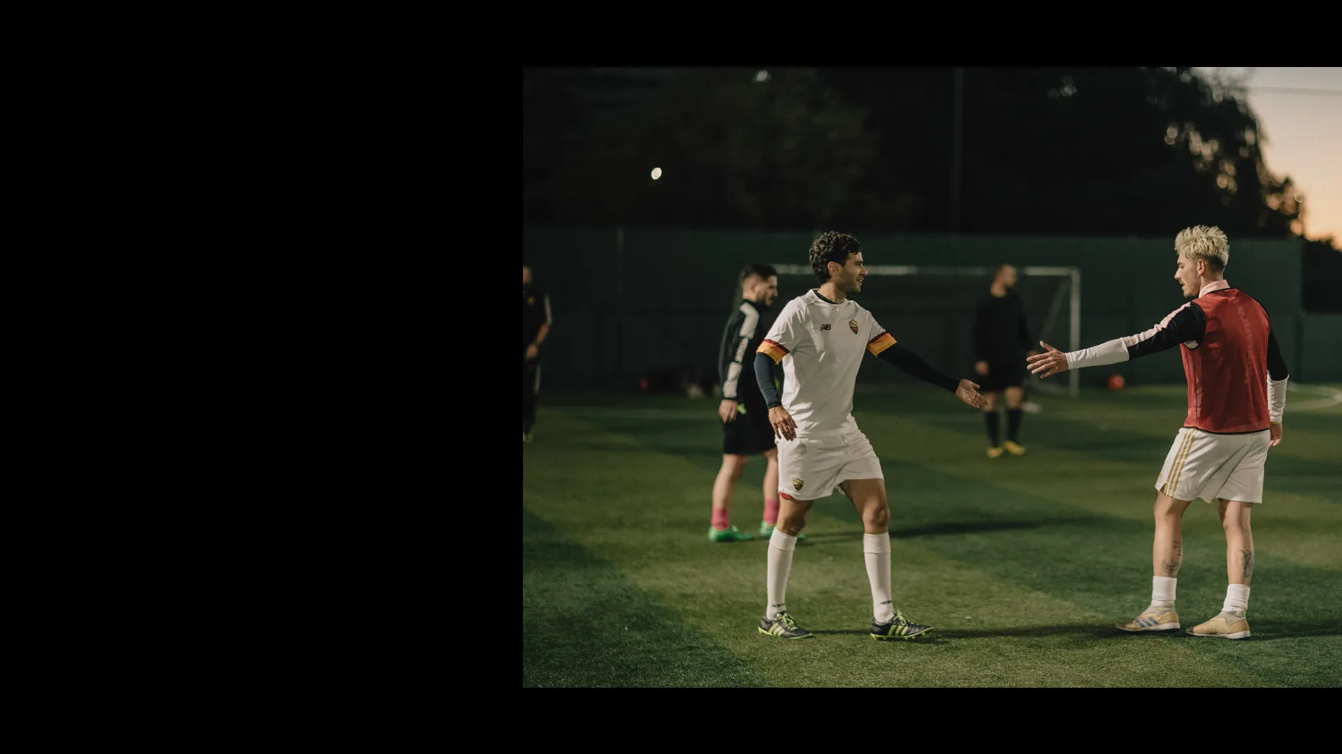 Men on a five-a-side pitch.