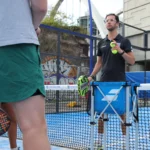 Coach leading an intro to padel session