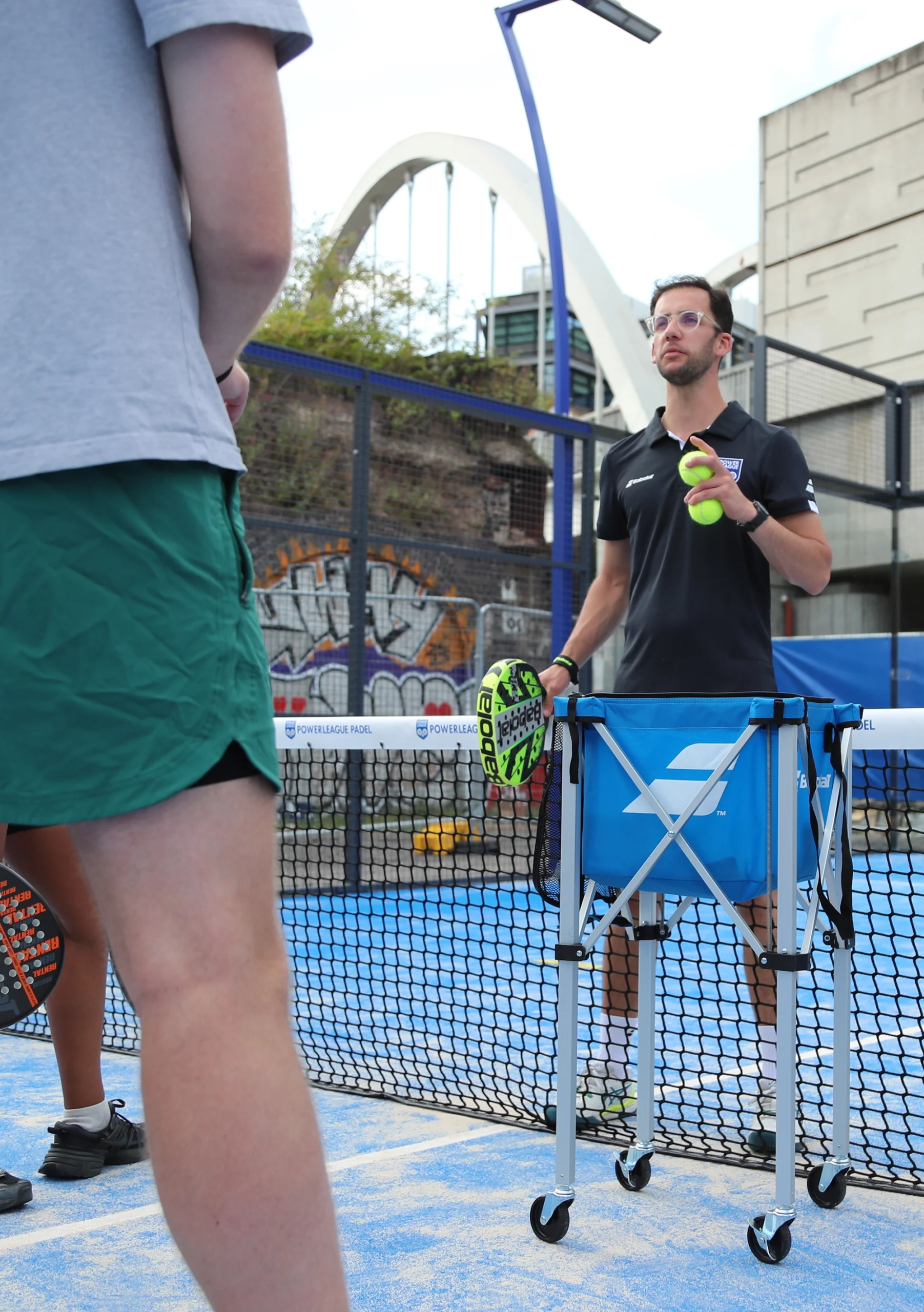 Coach leading an intro to padel session